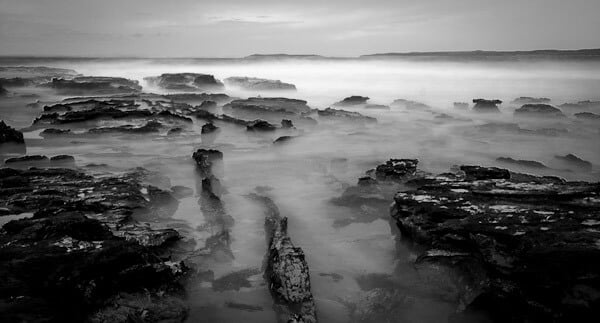 Long daytime exposure of the sea against rocks