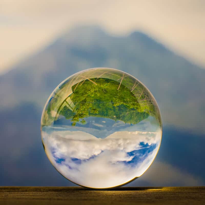 Volcano Gunung Batur on the island of Bali refracted through a glass sphere